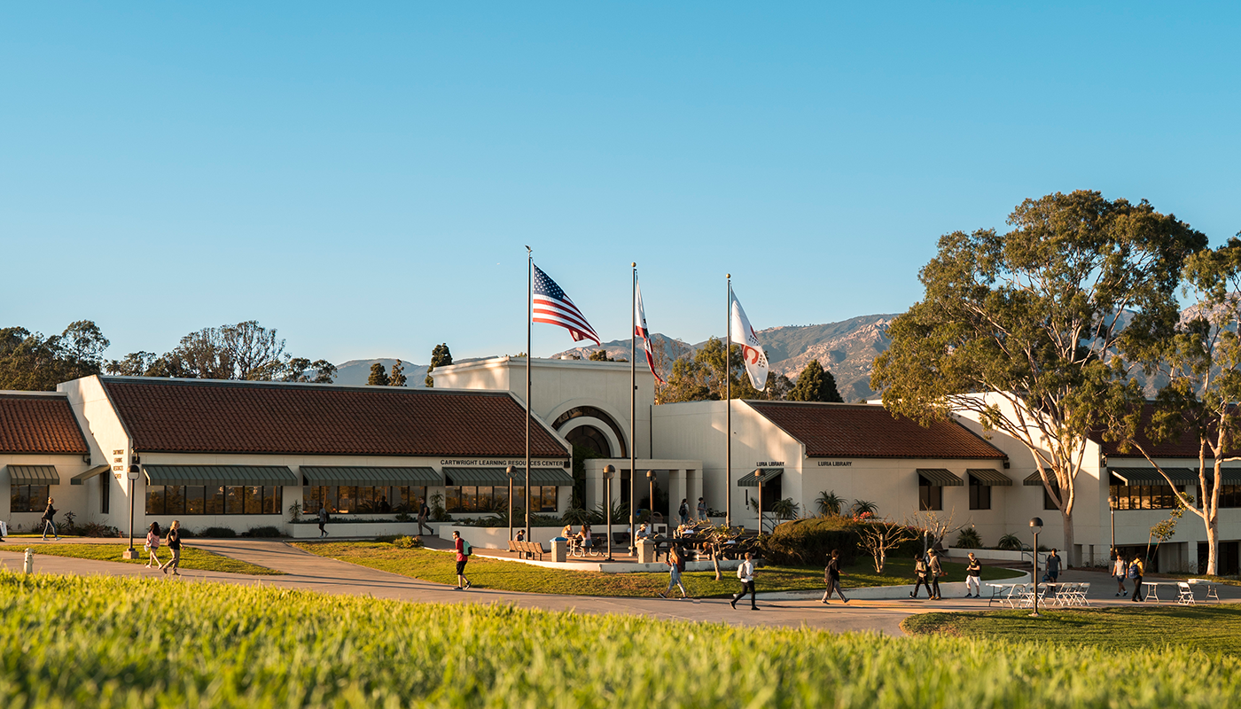 SBCC's Luria Library with the flags outside.